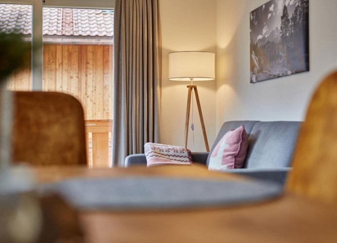 Wohnzimmer mit Schlafsofa